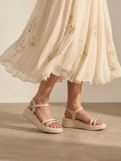 Fliora Cream Wedge Heels